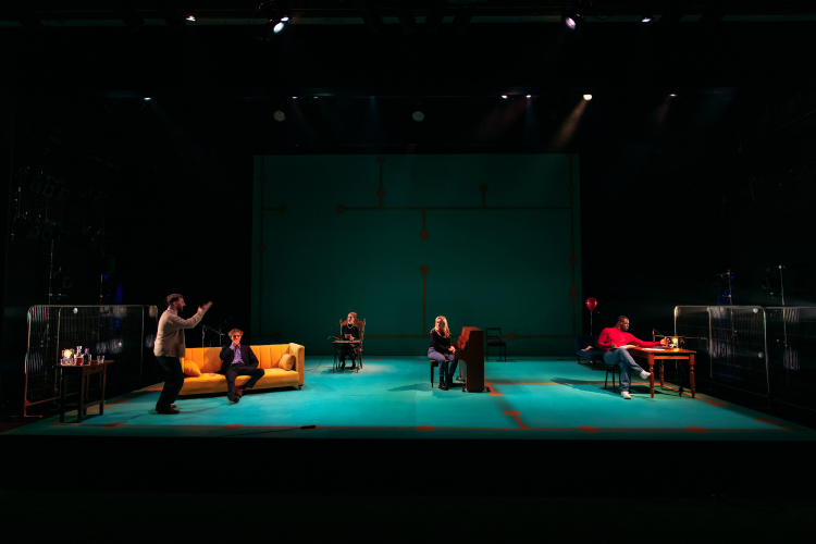 Actors performing on the set of Barbarians under a strong green light